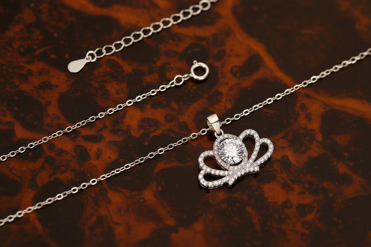 THE ICED-OUT QUEEN CROWN NECKLACE